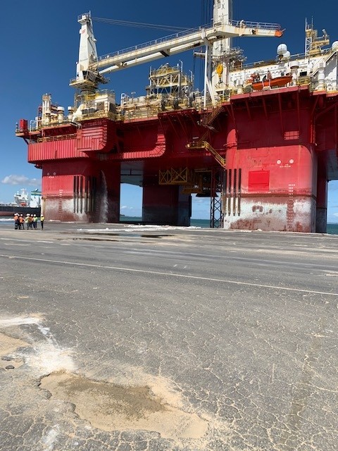 Offshore drilling rig alongside wharf